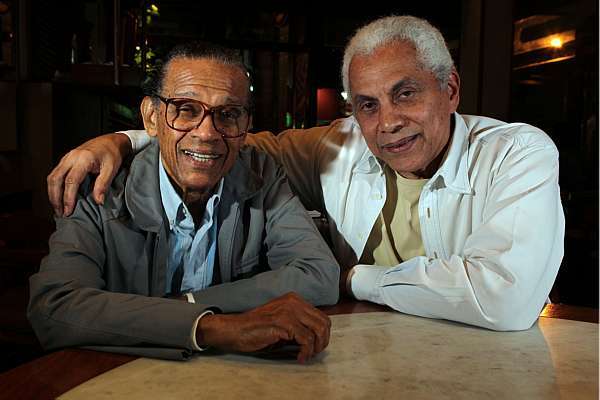 Elton Medeiros with friend and partner Paulinho da Viola. Medeiros was a master of the matchbox but said he didn't like posing with the "instrument" because he thought those kinds of pictures contributed to the folklorization of samba. 