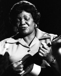 Dona Ivone Lara on the cavaquinho.