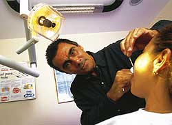 Guinga c. 2001 at his dental practice.